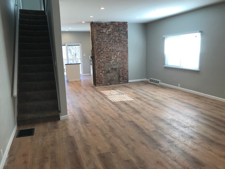 main floor open floor plan. - 717 Boggs Ave