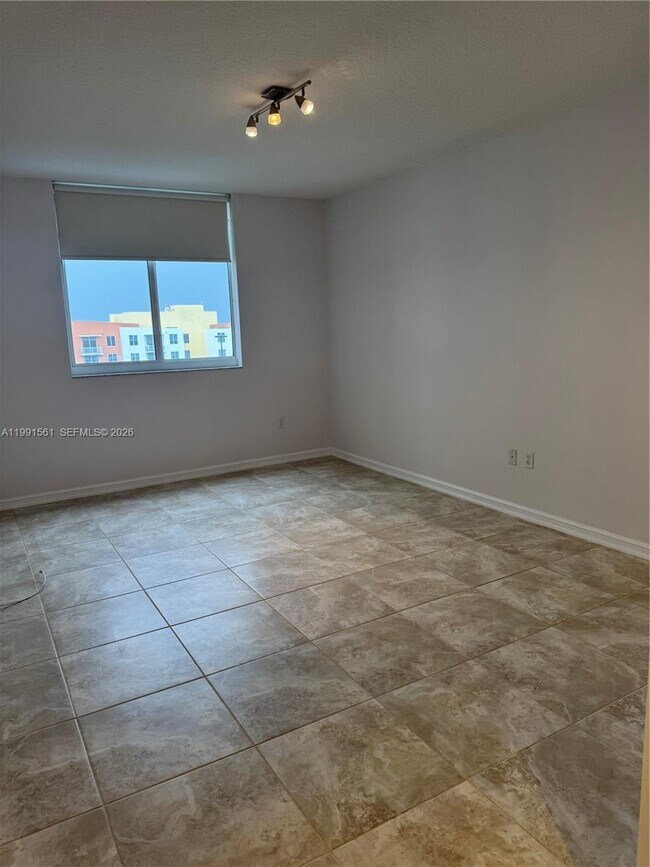 Building Photo - 18800 NE 29th Ave