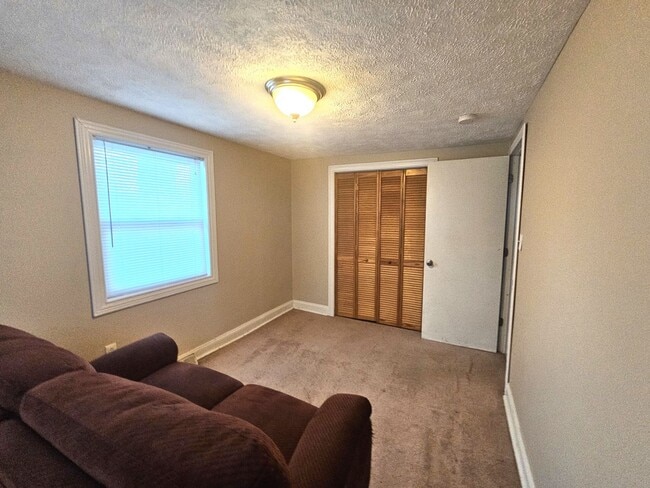Building Photo - Charming Corner Lot House in Cadillac, Mic...