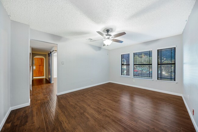 Building Photo - Sign your lease and receive a FREE 50" TV!!!  "Spacious 4-Bedroom Retreat with Fireplace in Charm...