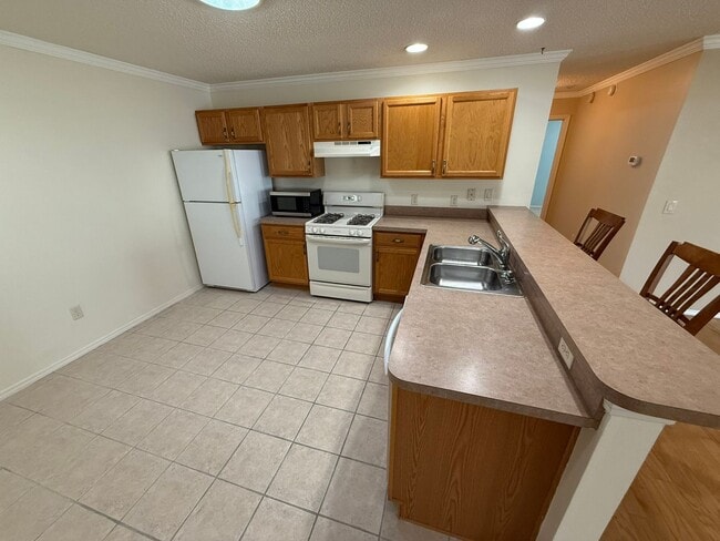 Building Photo - ANNUAL Rental in The Village of Piedmont - UNFURNISHED - 2 Bedroom 2 Bath Patio Villa, with pond ...