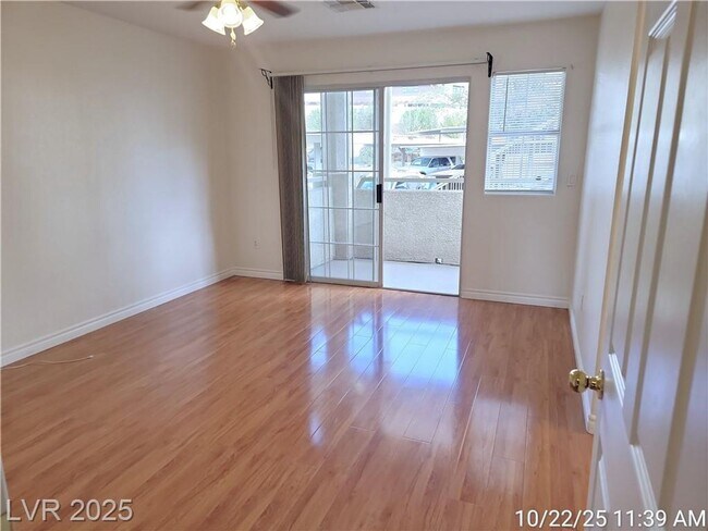 Building Photo - Inviting Green Valley Condo with Dual Balc...
