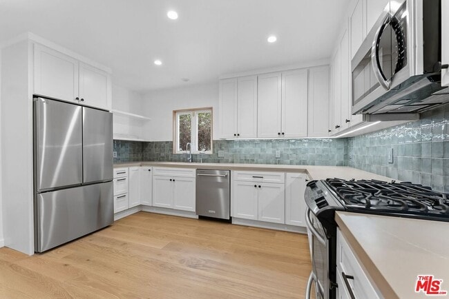 Building Photo - 8833 Ashcroft Ave