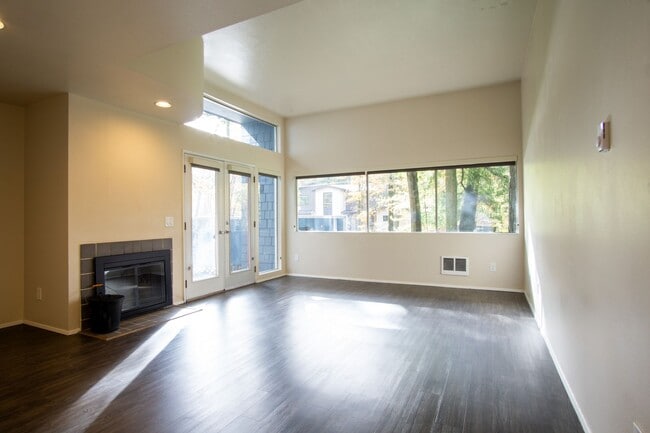 Building Photo - Gorgeous & Bright 1-Bed w/ Wood-Burning Fireplace, W/D, & Private Patio!