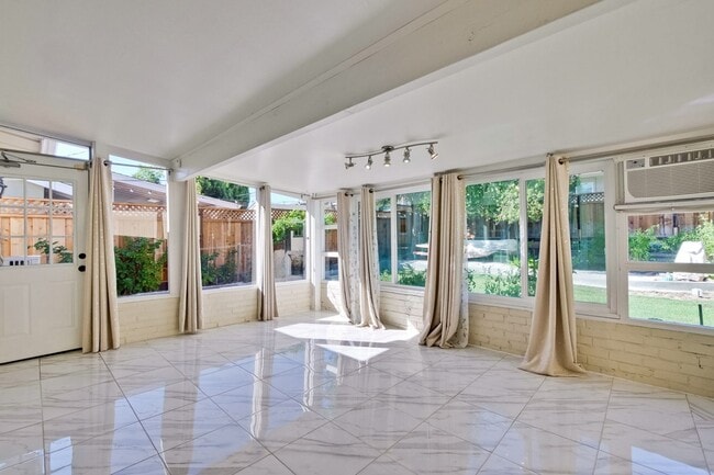 Building Photo - Turnkey Home with Natural Light & Upgrades...