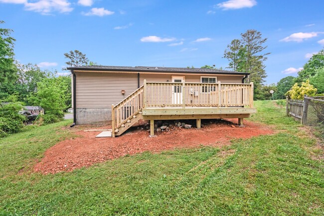 Building Photo - Fully Renovated 2BR Home with New Deck & L...