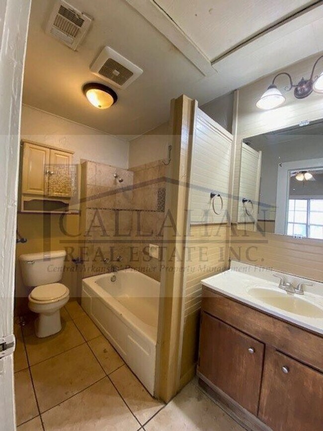 Building Photo - NLR 1 Bedroom Duplex