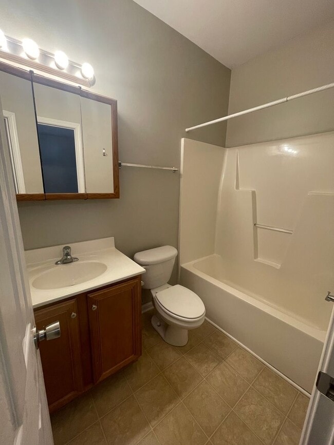 Building Photo - This two-story, 4-bedroom, 2-bath duplex in Fort Mill, SC sits on a corner lot