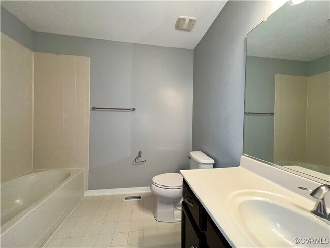 Building Photo - 3924 Village Townes Walk