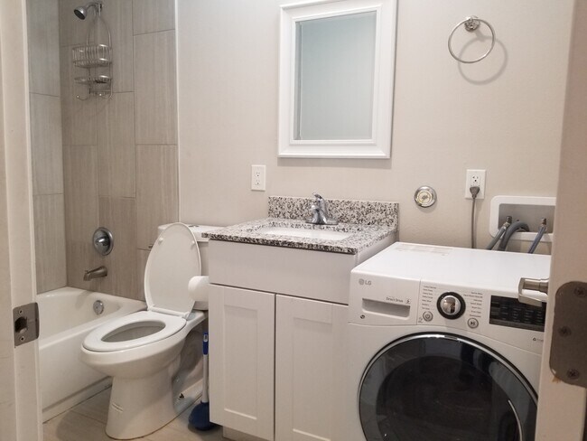 In unit washer/dryer combo. - 935 La Posada Dr