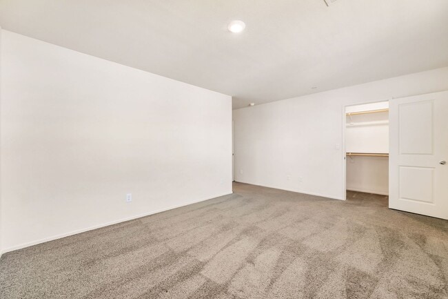 Building Photo - Modern West Henderson Townhome with Sleek Upgrades & Smart Home Features!