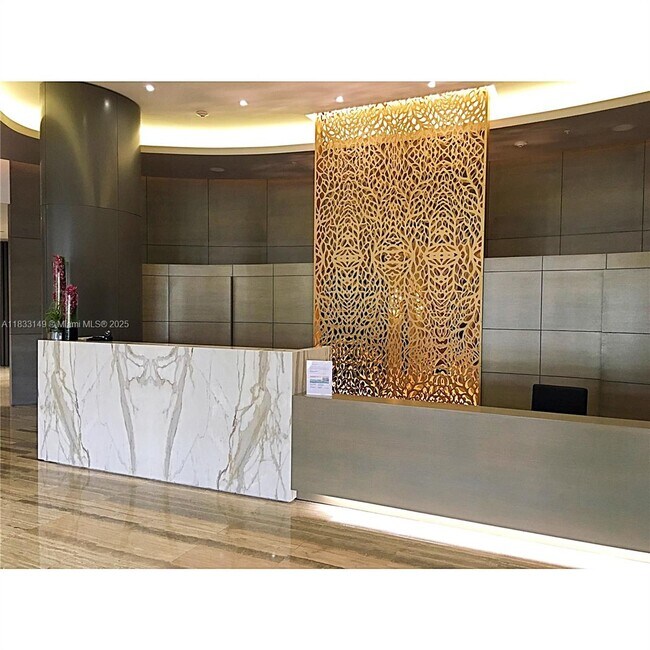 Building Photo - 10275 Collins Ave