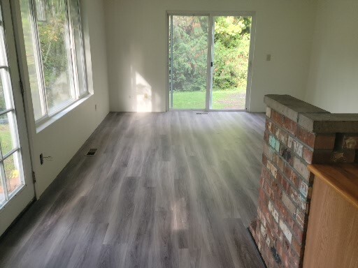 Family Room with Stove Fireplace - 1525 248th Ave SE