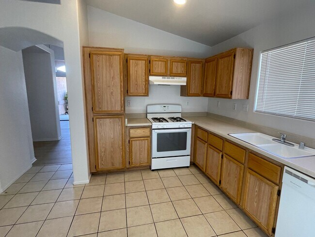 Building Photo - Adelanto Home-3 Bedrooms,2 Bathrooms, Laminate Floors, Indoor Laundry Room, Large Back Yard