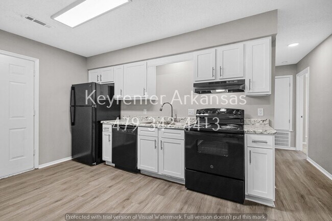 Building Photo - Cozy 2 Bedroom Duplex with Fireplace & Spacious Backyard!