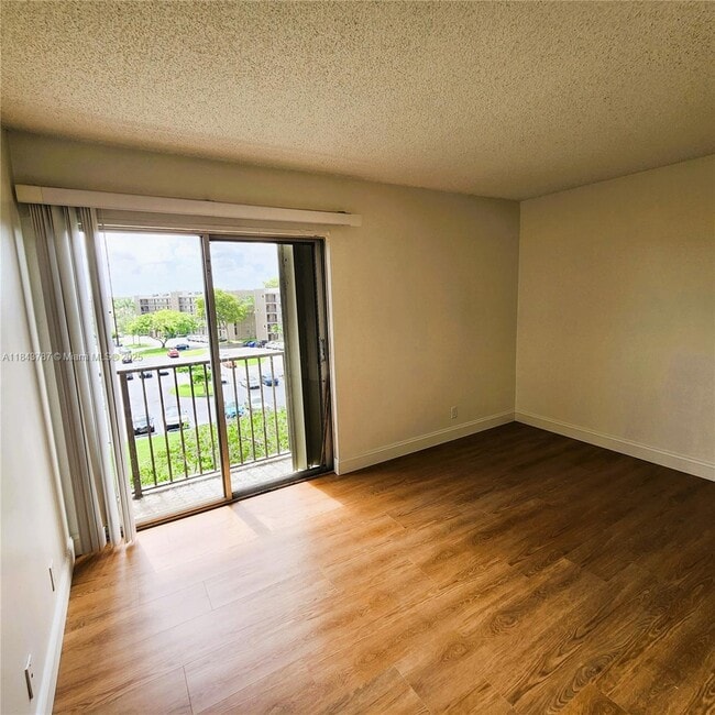 Building Photo - 8550 N Sherman Cir