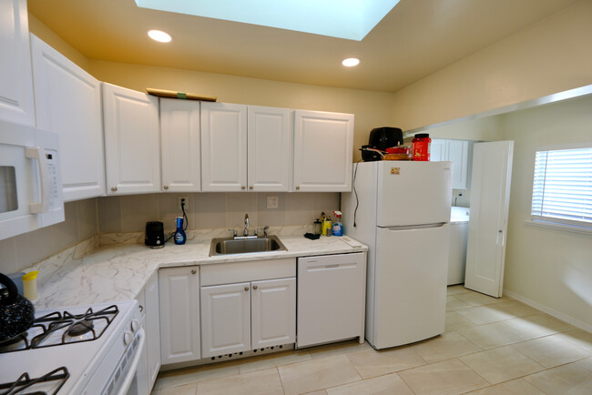 Laundry room off of kitchen - 227 1/2 E Victoria St