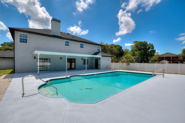 Building Photo - Rare Luxury Lease Opportunity | Spectacular 5-Bedroom Pool Estate on Nearly ¾ Acre Near Gulf Beaches