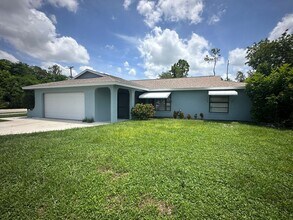 Building Photo - 3 Bedroom/ 2 Bath Fenced in Home for rent ...