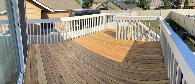 New elevated private deck with access to fully-fenced backyard with lawn, patio and BBQ. Brand new i - 2805 W Dumont Dr