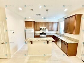 Building Photo - Luxury and Convenience Fully Equipped 3-Bedroom 2.5 Bathroom 2 Car Garage Townhome in Carson City