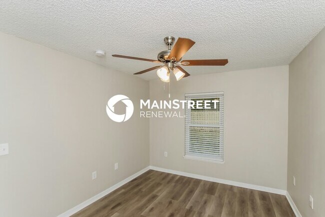 Building Photo - 4 Bedroom Pet-Friendly Home in Palm Bay, FL with Main Street Renewal