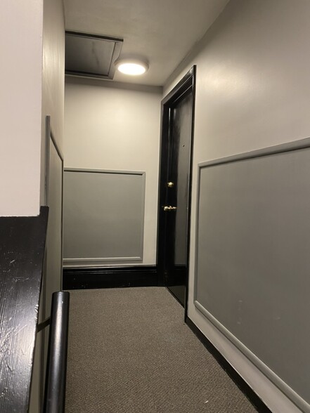 Newly painted and carpeted hallway - 6062 Transit Rd