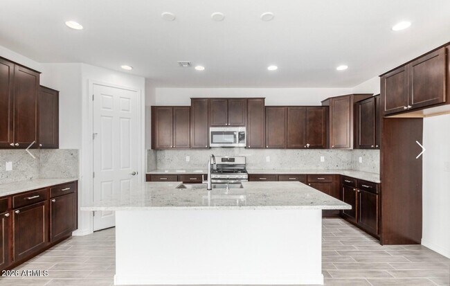 Building Photo - 9550 E Spiral Ave