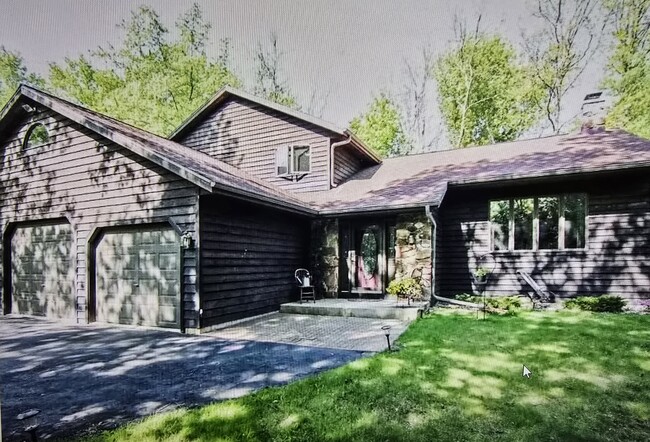 Front entrance with 3 car garage for ample storage - 808 Pony Ln