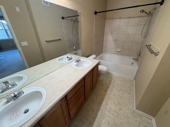 Building Photo - Move-In Ready Parker Condo with Stylish Upgrades & Patio