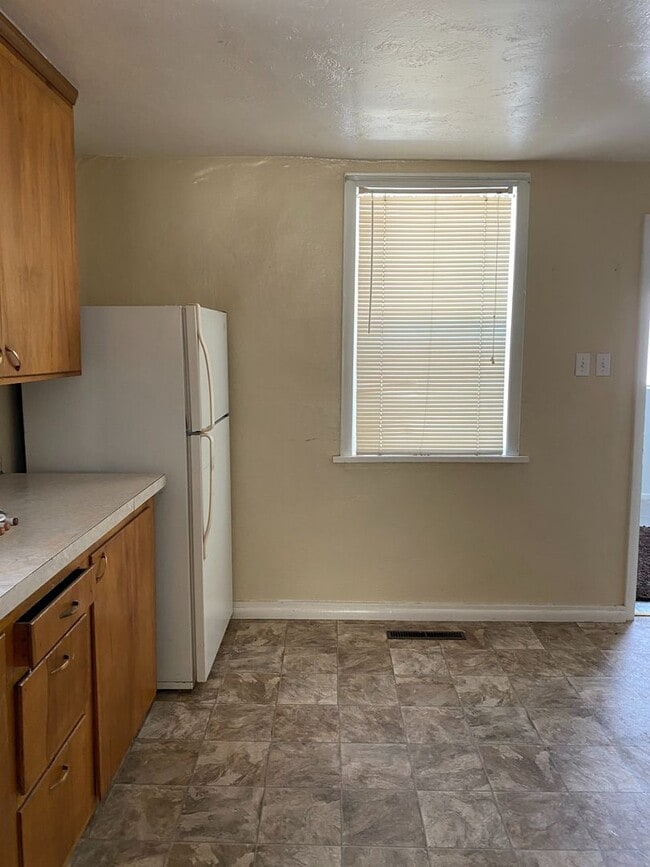 Building Photo - Cozy 2-Bedroom Home with Spacious Yard – C...