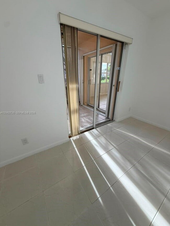 Building Photo - 12193 Royal Palm Blvd
