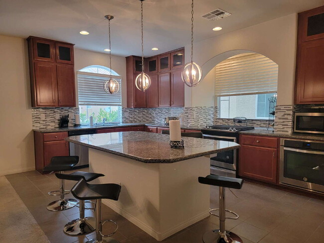 Building Photo - 4 bedroom home with a fully self  contained casita with a 3 car garage