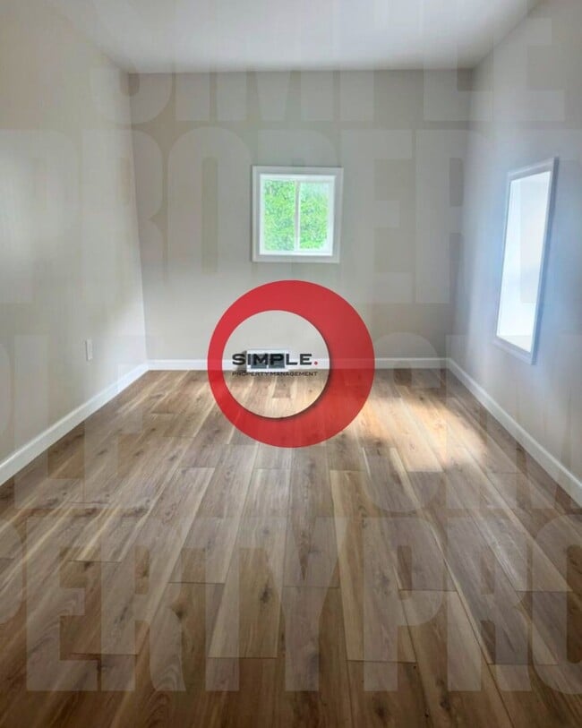 Building Photo - Two-bedroom one bath house with off street...