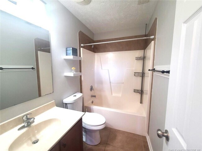 Building Photo - 5215 Woodpecker Dr