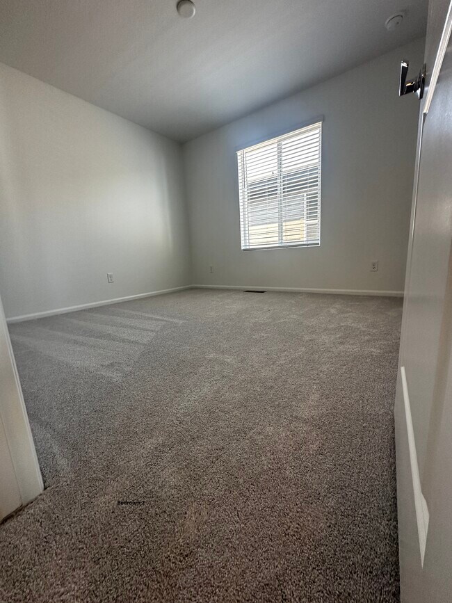 Building Photo - 21154 E 63rd Dr