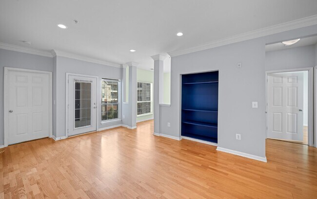 Building Photo - Two-bedroom, two-bathroom model with a den, located on the third floor.