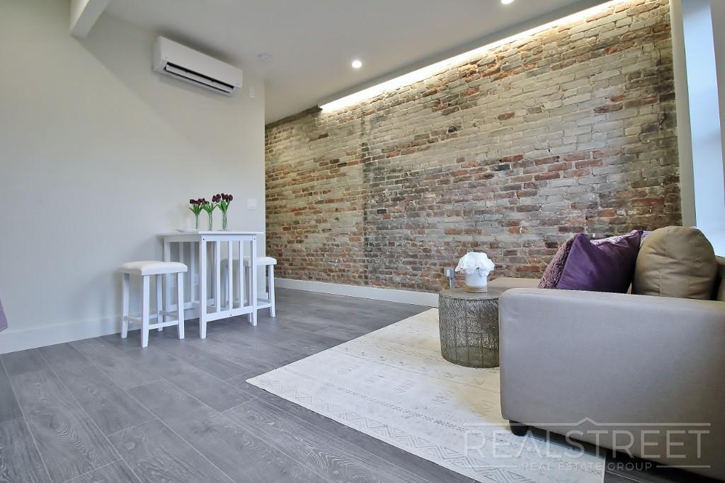 Building Photo - Spacious 2BR w/ Laundry, Pets OK, Backyard & Lounge | Steps to Brower Park & 3/4/C Trains