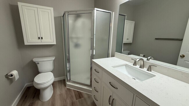Building Photo - Major Updates! Raised Ranch Style Condo wi...
