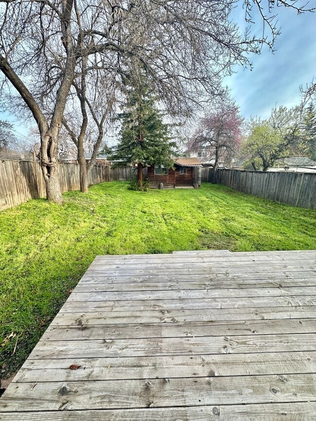 Building Photo - 1 Bedroom 1 bath Loft Style Single Family Home with large Fenced backyard.