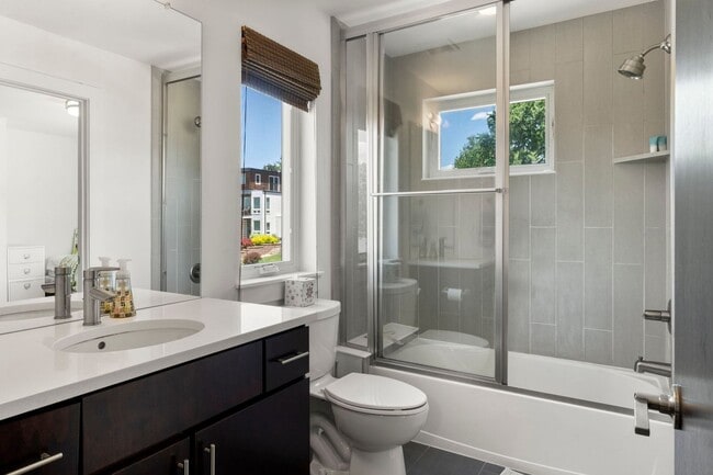 Building Photo - Modern 4BR/3.5BA Duplex with Finished Base...