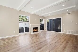 Building Photo - Renovated Townhome | Amazing South Coast Metro Costa Mesa Location