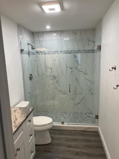 Brand new bathroom shower with glass wall and door - 4896 SE Horizon Ave