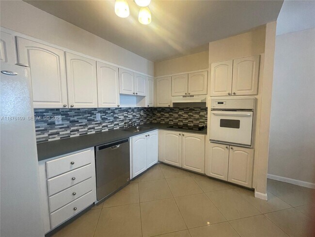 Building Photo - 19380 Collins Ave