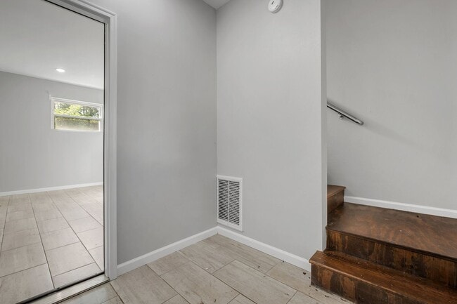 Building Photo - Modern Comfort Meets Prime Location — Stylish 2-Story Townhome