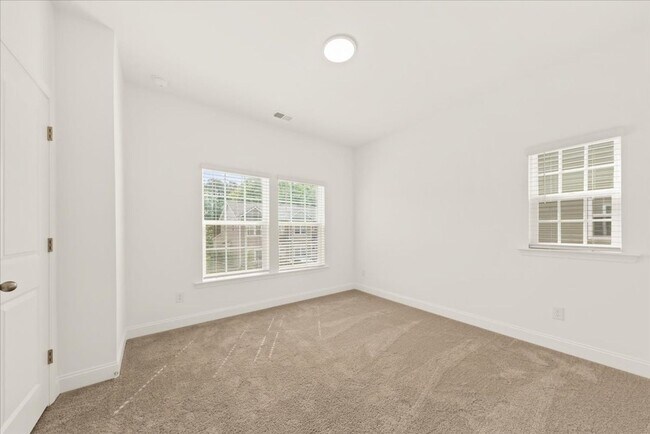 Building Photo - BRAND NEW TOWNHOUSE!!