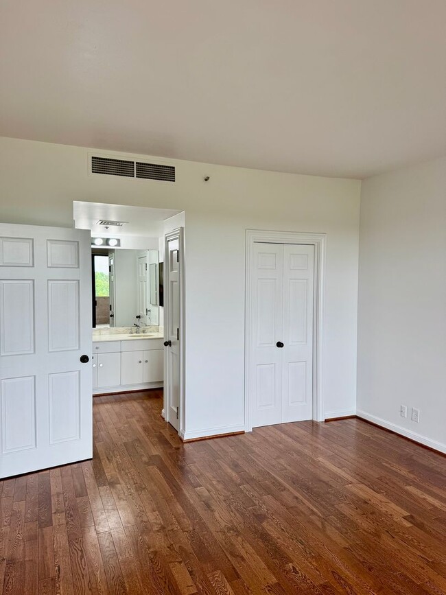 Building Photo - Experience Luxury and Prestige at Yorktown Condominiums