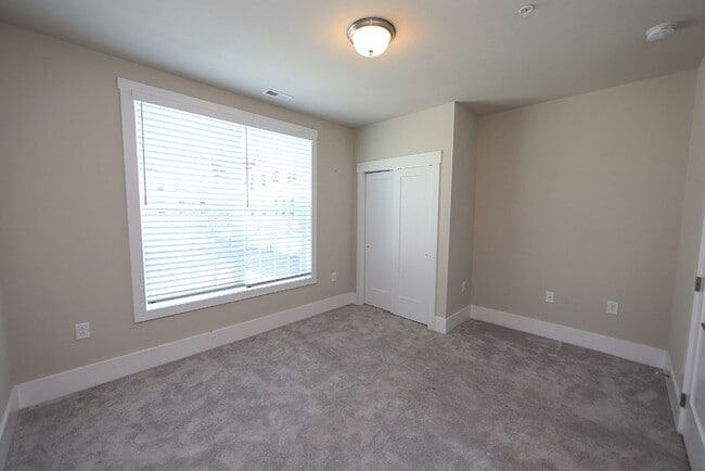 Building Photo - Modern Condo in Brier Creek Cottages Community w/ Oversized Garage!