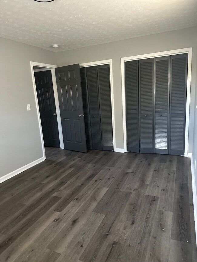 Building Photo - Welcome Home to Garfield Place Living: Whe...