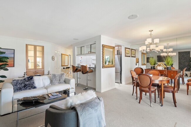 Building Photo - RARELY offered! Top floor three bedroom 2.5 bath El Escorial condo, fully furnished at East Beach.